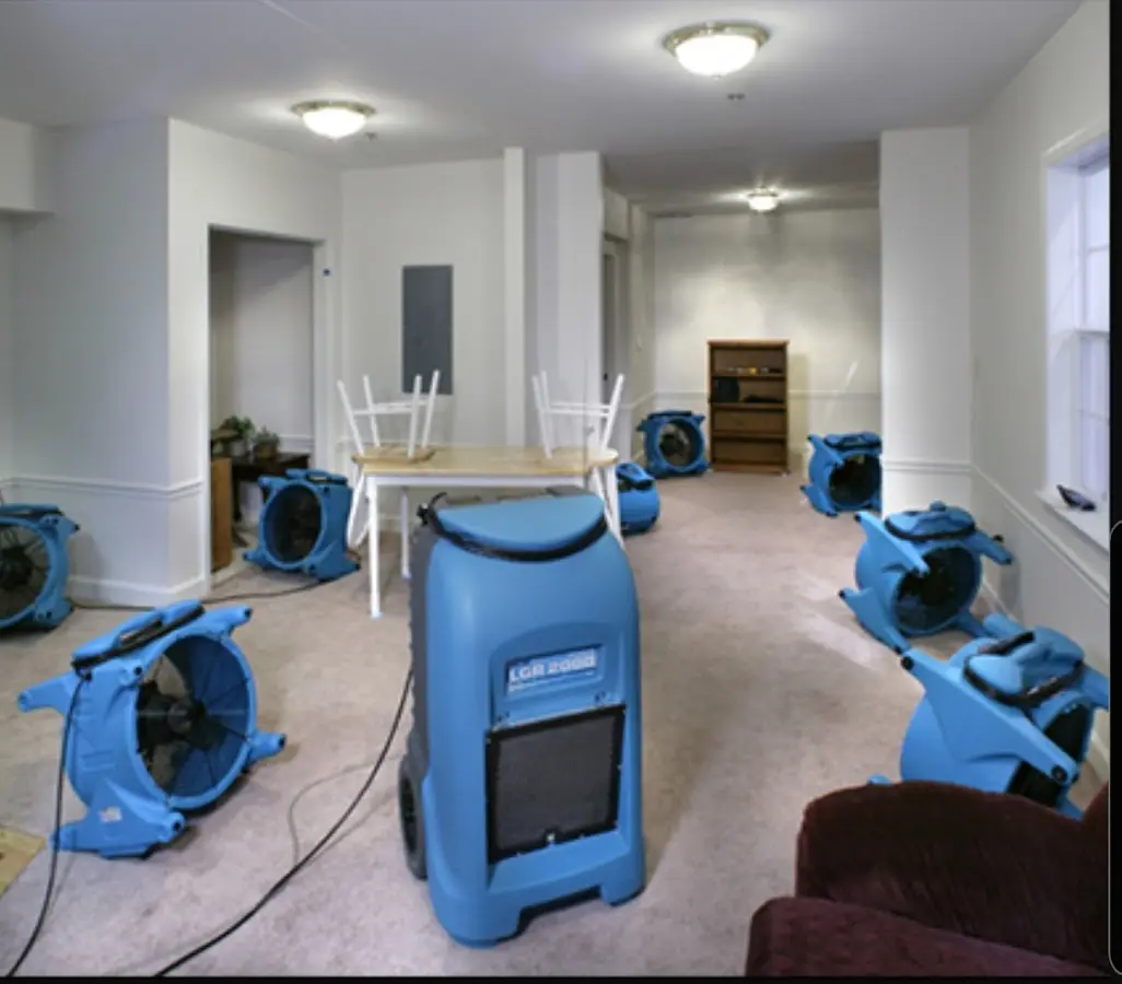 Air movers and dehumidifier setup for Water Damage Restoration in The Villages